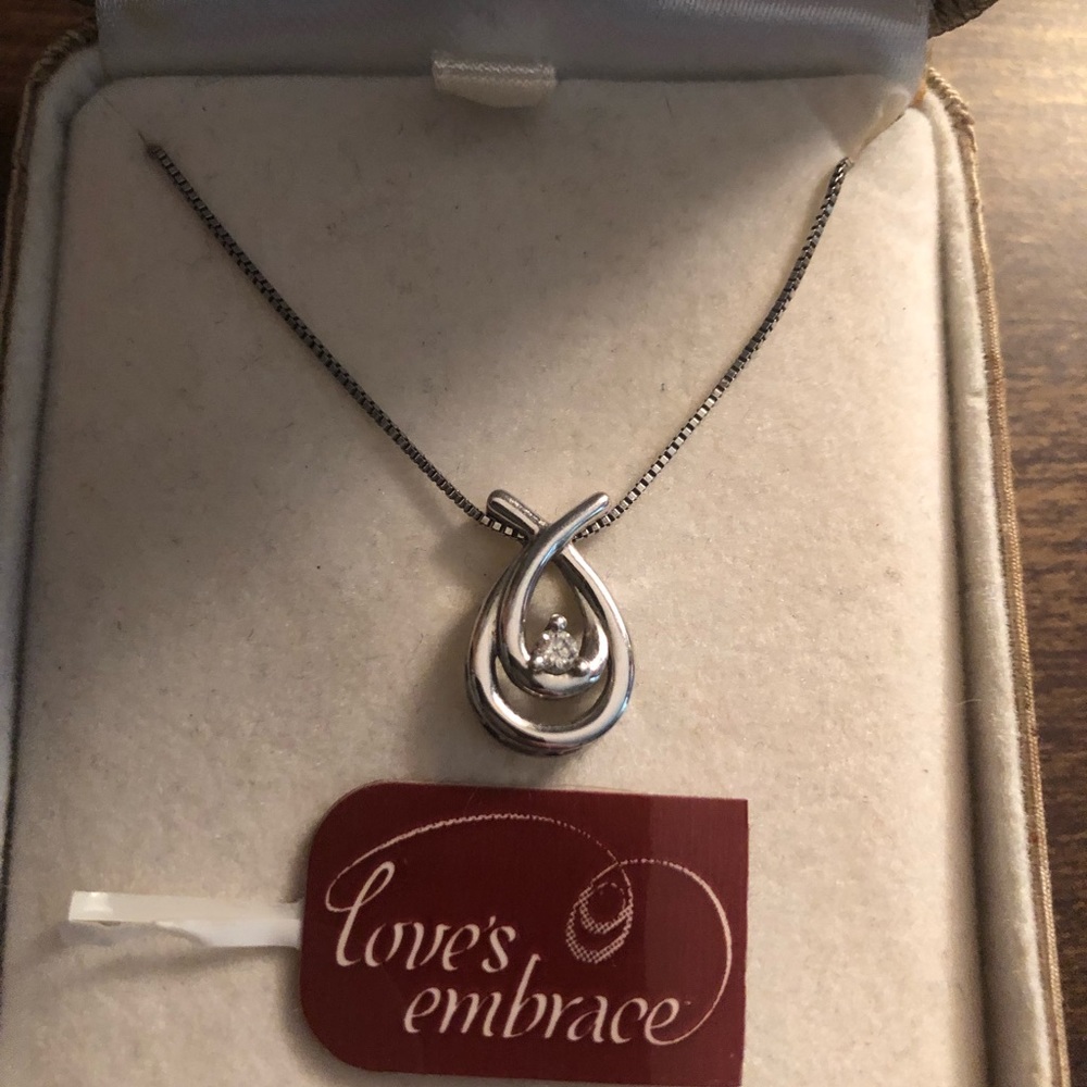 Silver and genuine diamond necklace.